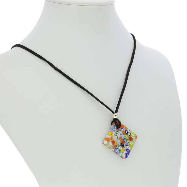 This trendy Murano millefiori pendant and earrings set makes any woman the center of attention with its bright colors, gorgeous floral patterns, and festive Venetian style. With their artistic talent and training in fine craftsmanship and Murano tradition that begins in their youth, Murano masters create beautiful jewelry, which reflects the uniqueness and beauty of Venice. Measurements: The Murano Glass Millefiori pendant has a diamond shape and measures 1-1/4 inch on each side. The pendant com Elegant Multicolor Jewelry With Flower Pendant, Elegant Multicolor Flower Pendant Jewelry, Elegant Multicolor Murano Glass Jewelry, Murano Jewelry, Italian Leather Handbags, Murano Glass Necklaces, Earrings Sets, Murano Glass Jewelry, Italian Bags