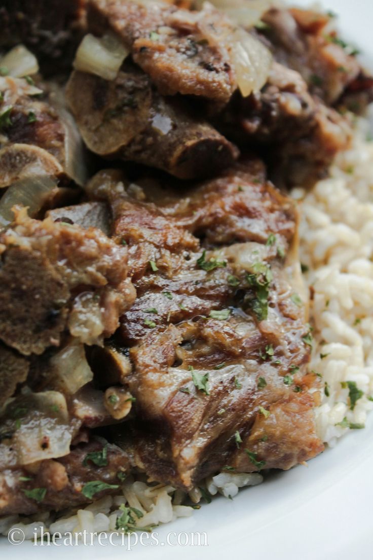 a close up of food on a plate with rice