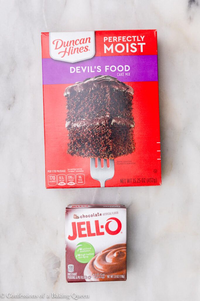 a box of jello next to a piece of cake