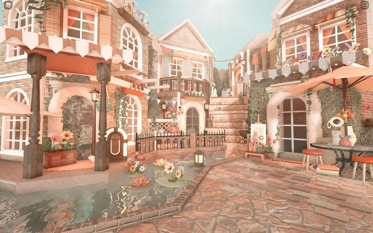 a digital painting of a courtyard with tables and chairs in front of some buildings that have flowers on them