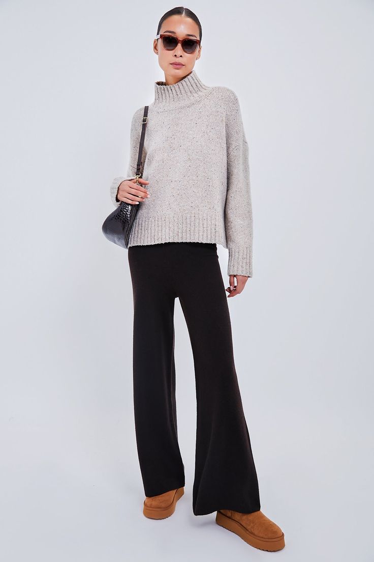 Cozy Comfort Meets Effortless StyleCrafted in the brand's signature luxe cashmere blend, the Zoe Pant is a truly versatile pull-on style knit pant with a relaxed leg silhouette and a wide, ribbed elastic waistband. Lounge in these at home, then throw on your favorite pull-over and loafers to step out.Our Favorite Details: Elastic waistband Pull-on style Relaxed fit Wide leg silhouette Material: 25% Cashmere, 45% Superfine Lambswool, 30% ViscoseCare: Dry cleanAbout the BrandFounded in Los Angeles Chic Wide Leg Pants With Ribbed Waistband For Fall, Cozy Cashmere Bottoms For Winter, Cozy Cashmere Bottoms For Fall, Fall Wide Leg Straight Pants With Ribbed Waistband, Chic Cashmere Winter Bottoms, Chic Winter Cashmere Bottoms, Cozy Wide-leg Pants For Fall, Ribbed Wide Leg Pants For Fall, Fall Wool Pants For Loungewear