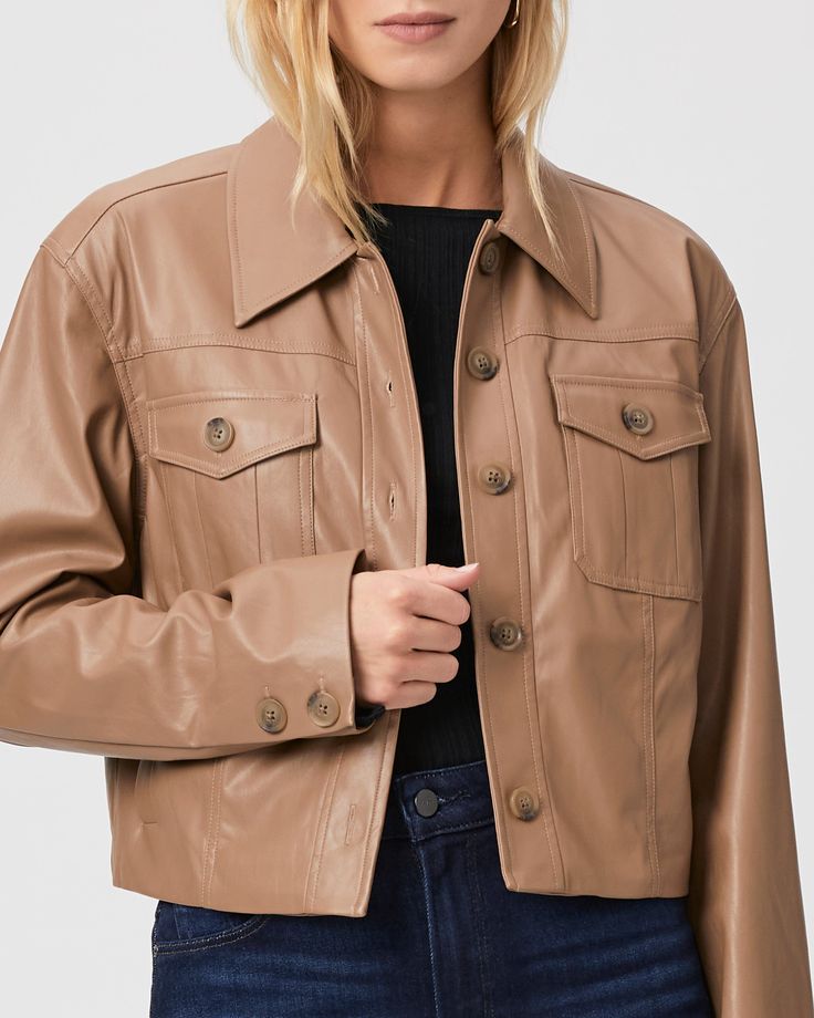 Crafted from a drapey faux leather, this cropped jacket comes in a tan shade and is designed with front patch pockets and seaming details. Pair this casual-cool layering piece with any shade of denim in your closet. | Fenwick Jacket - Burnt Sugar Faux Leather | Size Large Chic Cropped Jacket With Flap Pockets For Spring, Fitted Cropped Jacket With Patch Pockets For Fall, Trendy Cropped Jacket With Flap Pockets, Fall Cropped Jacket With Flap Pockets, Cropped Outerwear With Patch Pockets For Fall, Spring Leather Jacket With Patch Pockets For Work, Spring Workwear Leather Jacket With Patch Pockets, Trendy Brown Cropped Jacket For Fall, Brown Leather Long Sleeve Cropped Jacket