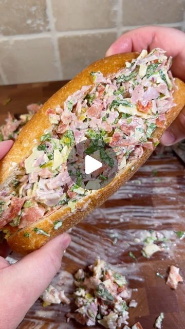 Brian Gerwig on Instagram: "Chopped Italian Sandwiches! This was so good!! Recipe ⤵️

* Start with 2 big handfuls of lettuce (roughly 2.5 cups)
* Add 6 slices of each: ham, pepperoni, salami, provolone, tomato slices
* Add 1/4 cup of pepperoncini and red onions and start chopping
* Once it gets a good rough chop, add in 1/4-1/3 cup mayo, 2/3 Tbsp olive oil and red wine vinegar, 1 Tbsp Italian seasoning and salt/pepper to taste 
* Continue chopping until everything is mixed well and chopped to your preference 
* Scoop it into a sub roll and enjoy! 
* To bring the deli to full affect, wrap it tightly in parchment paper for a couple minutes before slicing in half! 
* Enjoy!!

#sandwich #choppeditaliansandwich #italiansub" Chopped Italian Sandwich Video, Chopped Italian Sandwich Wrap, Chopped Italian Sub Sandwich, Sub Oil Recipes, Chopped Sandwich Ideas, Chop Sandwich Recipes, Chopped Sandwich Recipe, Chopped Sub Sandwich, Chopped Italian Sub