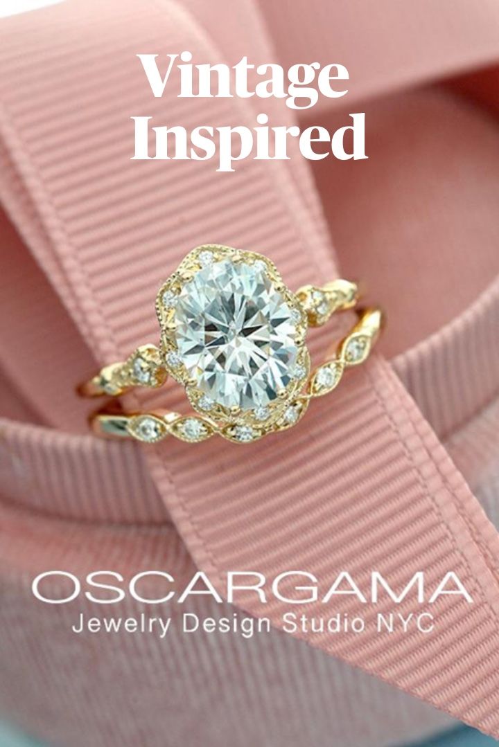 a close up of a ring on top of a pink cloth