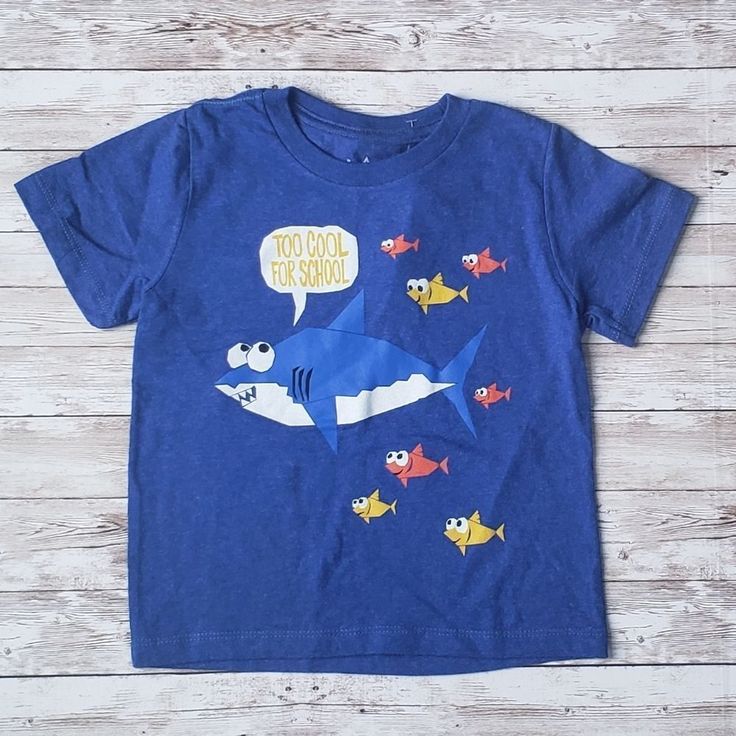 Blue Jem Kids Shirt With A Shark Leading School Of Fish. Shirt Reads "Too Cool For School". Baby Shark. Size 4 Blue Fun T-shirt For Playtime, Playful Blue T-shirt For Playtime, Blue Short Sleeve Shirt With Cartoon Print, Cute Blue Cotton Shirt, Blue Cotton Top With Cartoon Print, Blue Fun T-shirt For Playwear, Fun Blue T-shirt For Playwear, Fun Blue T-shirt For Playtime, Blue Crew Neck T-shirt For Playwear