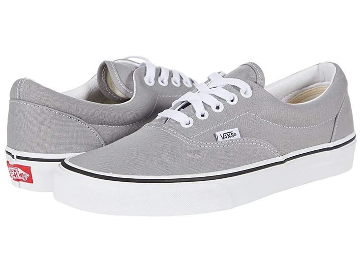 Vans Era - Skate Shoes : Drizzle/True White : The Vans Era skate shoes keep your style going strong with clean and uncomplicated style, with more padding than the classic Authentic. Skateboard shoes with a low-top silhouette. Uppers of canvas or suede with a double-stitched vamp. Cotton drill lining for breathable wear. Padded collar for added support. Die-cut EVA insert for reliable comfort. Vulcanized sole attachment with iconic waffle outsole for grippy wear and boardfeel. Imported. Measureme Gray Canvas Sneakers With Vulcanized Sole, Casual Gray Canvas Shoes For Streetwear, Vans Low-top Canvas Shoes With Gum Sole, Urban Cotton Skate Shoes With Rubber Sole, Gray Low-top Vulcanized Sole Skate Shoes, Gray Lace-up Skate Shoes With Vulcanized Sole, Gray Lace-up Skate Shoes With Gum Sole, Gray Canvas Shoes For Streetwear, Gray Vulcanized Lace-up Skate Shoes