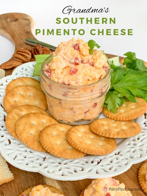 a plate with crackers and some food on it