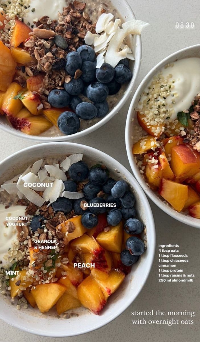 three bowls filled with fruit and yogurt on top of a table next to each other