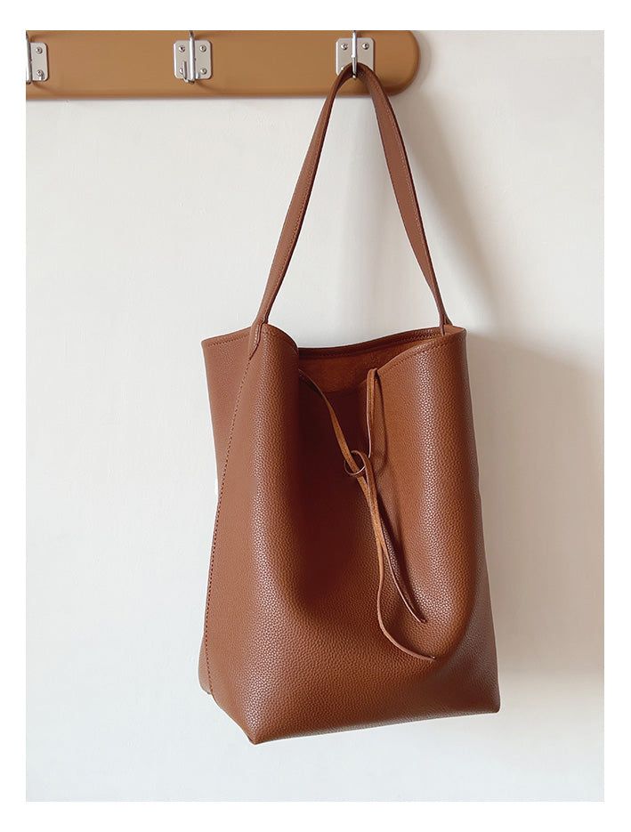 2024 New style. Simple leather bucket bag. Material: PU Leather Size: 14.1"H x 15.7"W x 5.9"D Extra crossbody strap Designer Style ID: 8771 Chic Bucket Leather Bag with Shoulder Strap and Inner Pouch, Women's Everyday Handbag Bucket Bag For Office In Fall, Large Capacity Bucket Bag For Fall, Everyday Bucket Bag Tote With Long Strap, Chic Long Strap Tote Shoulder Bag, Bucket Satchel For Office Use In Fall, Office Bucket Shoulder Bag, Fall Bucket Satchel For Office, Fall Office Satchel Bucket Bag, Office Bucket Satchel For Fall