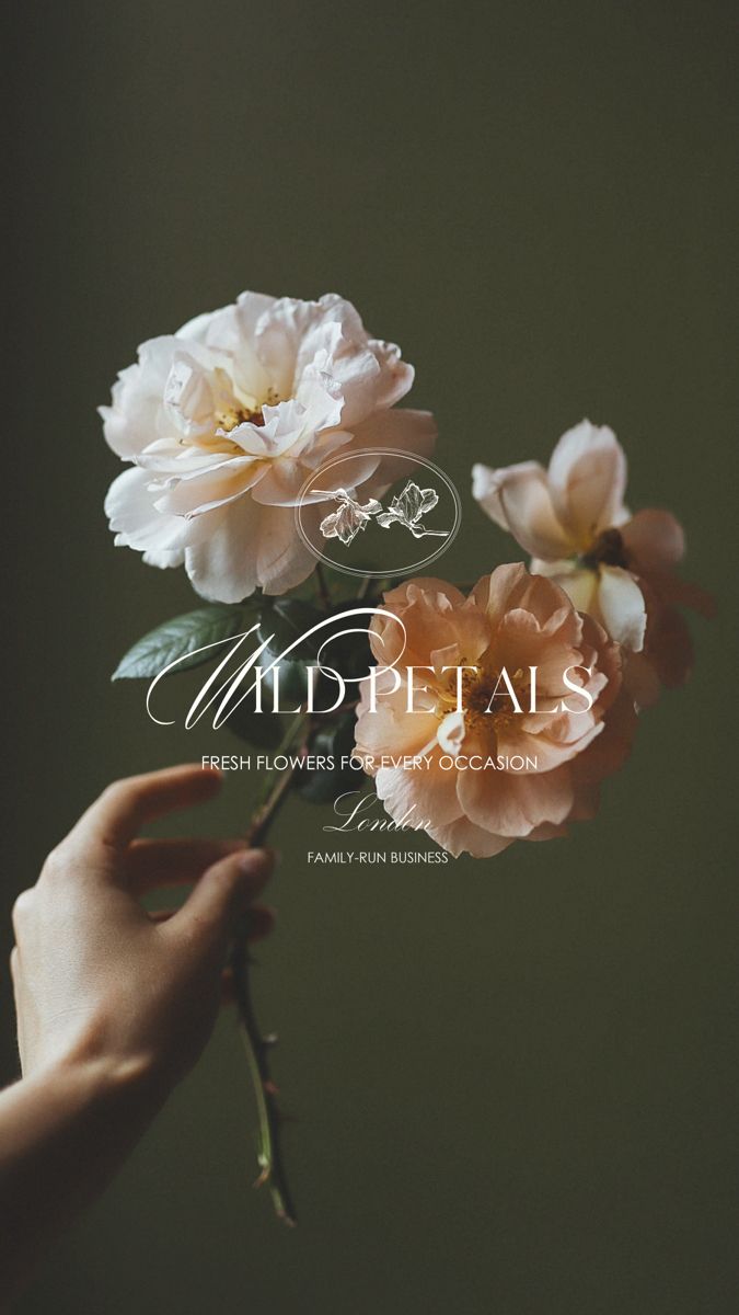 a person holding flowers in their hand with the words wild petals on it's side