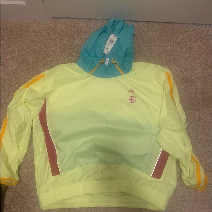 Brand New Yellow Sportswear Outerwear For Fall, Spring Yellow Sports Outerwear, Yellow Athleisure Outerwear For Winter, Adidas Green Track Jacket For Spring, Yellow Sportswear Outerwear For Winter, Spring Sports Yellow Outerwear, Casual Yellow Track Jacket For Fall, Yellow Track Jacket For Spring Streetwear, Casual Yellow Windbreaker For Sports