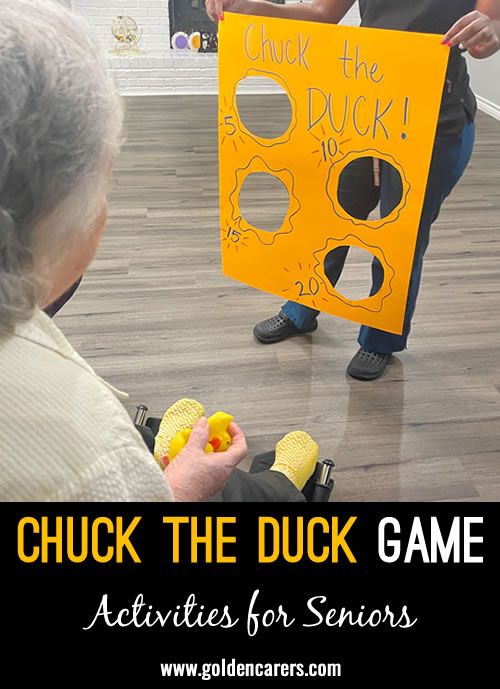 an older woman holding up a yellow duck game with the words chuck the duck on it