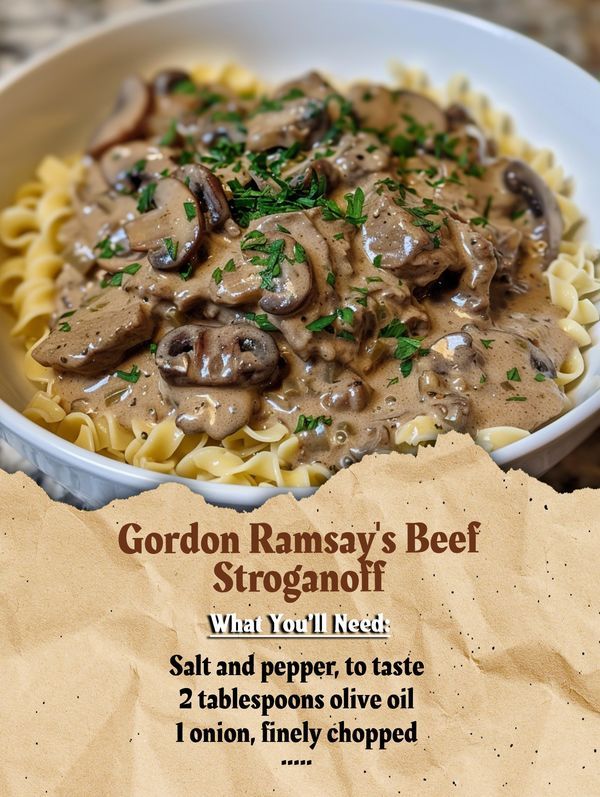 a white bowl filled with pasta covered in mushroom gravy next to a piece of parchment paper