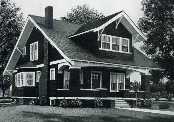 an old black and white photo of a house