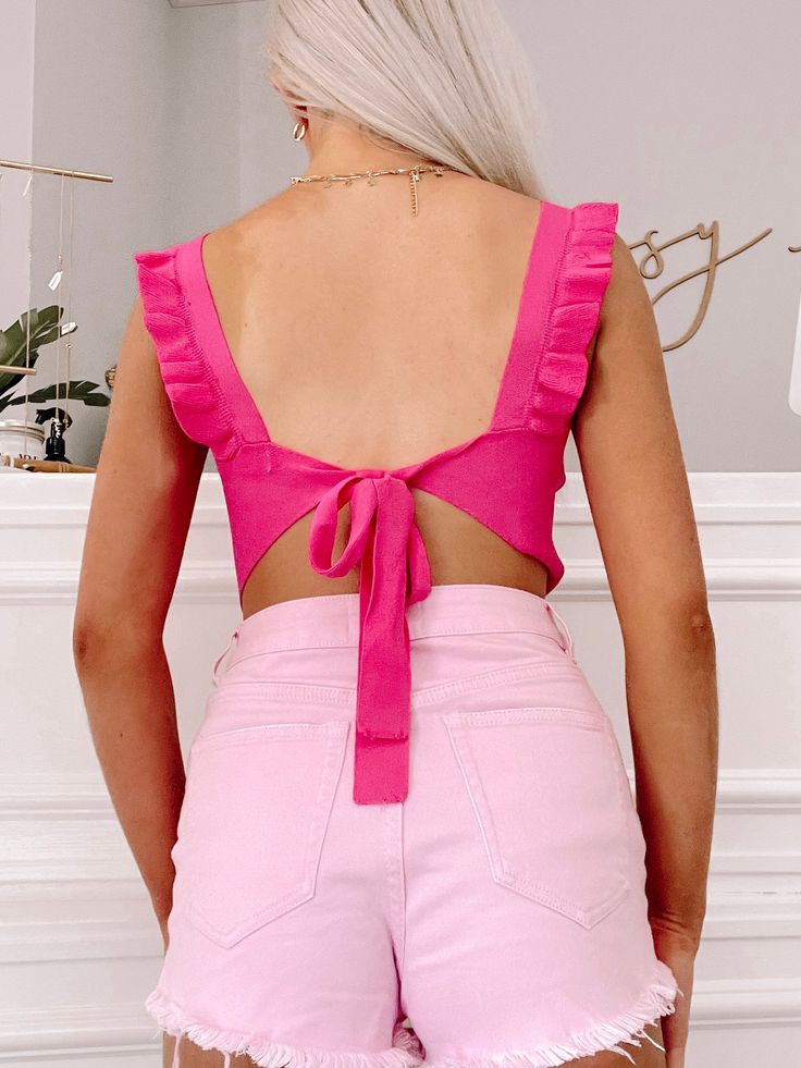 An upgrade to your go to tank -- our Kiss and Tell Top showcases a square neckline and ruffle straps on a hot pink sweater tank that ties in the back. content: 65% rayon, 35% nylon Kiss And Tell, Hot Pink Sweater, High School Outfits, Ruffle Tank Top, Sweater Tank, Square Necklines, Pink Sweater, School Outfits, Square Neckline