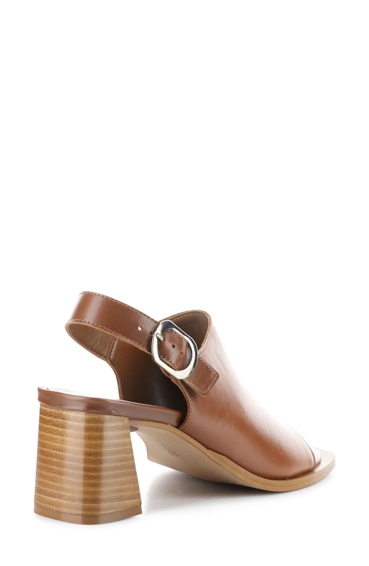 A squared-off toe and stacked block heel balance a slingback leather sandal set on a cushioned footbed for comfortable wear. 2 1/2" heel Adjustable slingback strap with buckle closure Cushioned footbed Leather upper/synthetic lining and sole Made in Italy Modern Mules With Buckle Closure And Block Heel, Spring Slingback Pumps With Stacked Heel And Square Toe, Brown Square Toe Mules With Padded Heel, Brown Square Toe Mules With Stacked Heel, Classic Sandals With Sculpted Heel And Square Toe, Modern Brown Mules With Square Toe, Modern Brown Heels With Buckle Closure, Modern Brown Block Heels For Spring, Casual Slingback Sandals With Block Heel And Removable Insole