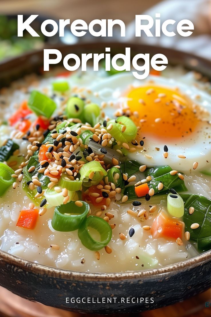 a bowl filled with rice and vegetables on top of a table