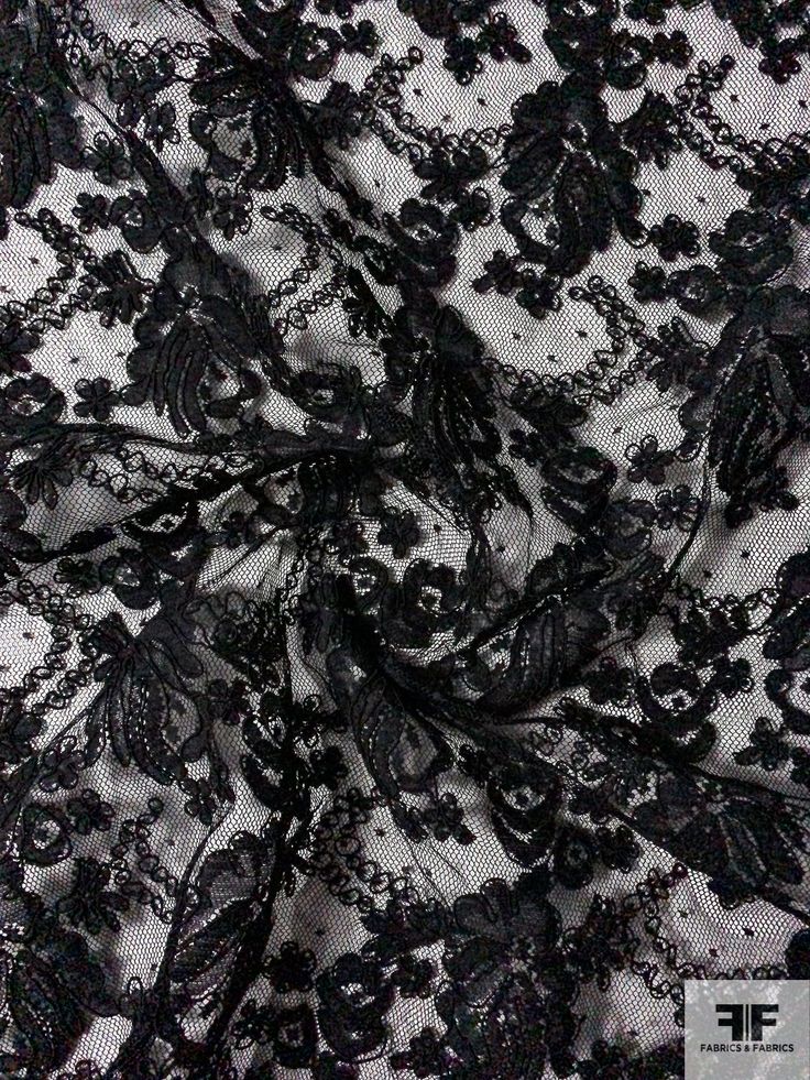 This black floral double-scalloped corded lace designer fashion fabric is extremely elegant and high quality. SKU: 12270 Content: Polyester Color: Black Width: 52 inches This fabric is a last cut and no longer in production. Once sold out, we are unable to get more. Black Lace Fabric Pattern, Goth Fabric, Lace Fabric Pattern, Black Aesthetic Fashion, Black Sheer Fabric, Black Lace Pattern, Stylish Laundry Room, Black Lace Fabric, Gothic Lace