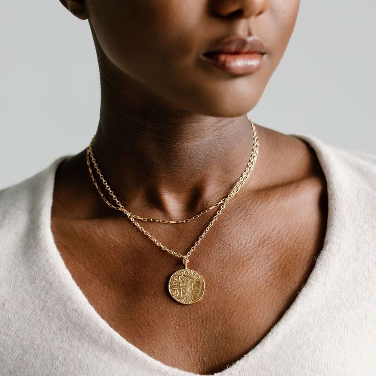 This pendant is a cast made from a shipwrecked coin The size of the pendant is approximately 2.5cm in diameter (about the size of a US quarter) Pendant is sustainably and ethically made from 100% recycled brass and gold or silver plated This pendant has a large enough jump ring on it to fit through all Laura Elizabeth chains except the Alana (6.0mm Width Flat Elongated Gold Filled Chain) I named this pendant after a dear friend whom I once nannied for. Friend doesn't cut it. We are family. When I discovered that my ex husband was choosing behavior that wasn't in alignment with our marital agreement (trying to be nice here guys), I called Holly crying. That night, I showed up to her house in shock. She met me outside with a glass of wine and a hug that lasted a lifetime. Prior to that fatef In Shock, A Glass Of Wine, We Are Family, Glass Of Wine, A Hug, Ex Husbands, Anklet Jewelry, Be Nice, Coin Pendant