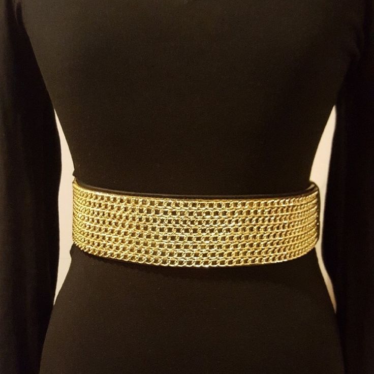 Elastic Gold Chain Belt. Snaps In Back. Fits Up To 36" Waist Chic Black Chain Link Belt, Adjustable Chic Chain Necklace For Parties, Black Metal Waist Chain For Party, Black Party Waist Chain With Chain Strap, Black Chain Belt For Party, Adjustable Black Chain Belt With Chain Strap, Black Metal Waist Chain With Chain Strap, Adjustable Black Chain Belt, Chic Black Chain Necklace For Party