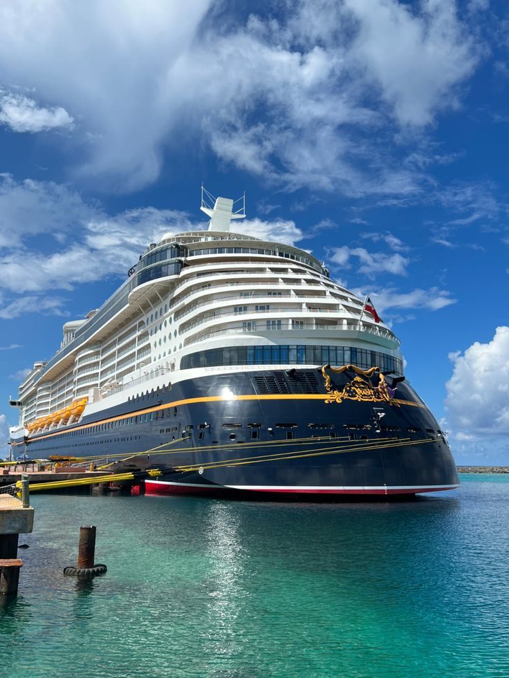 a large cruise ship docked in the water