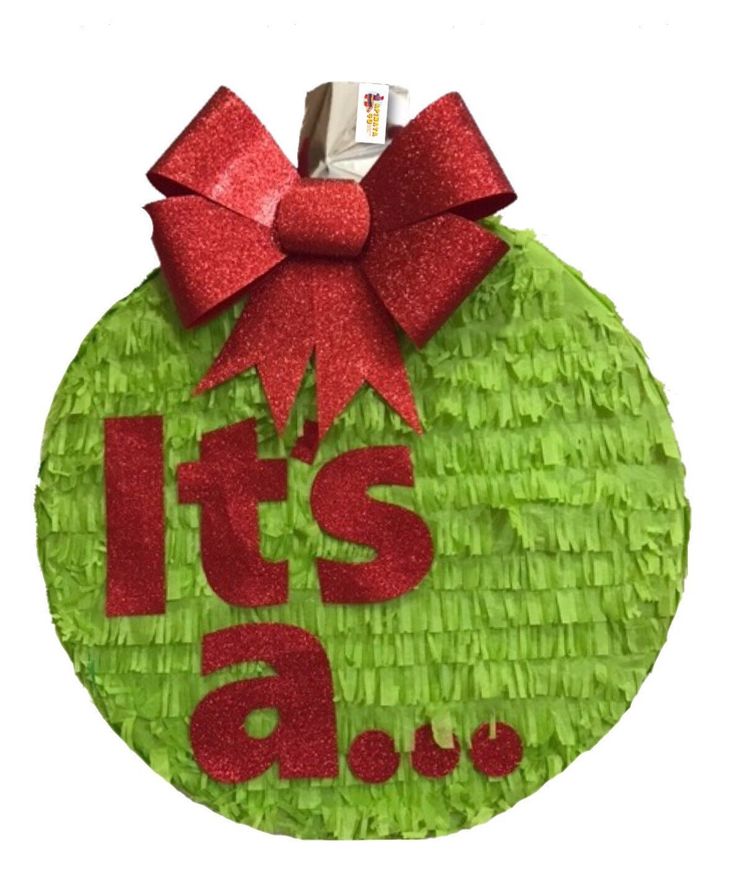 a green ornament with a red bow and it's a boy message