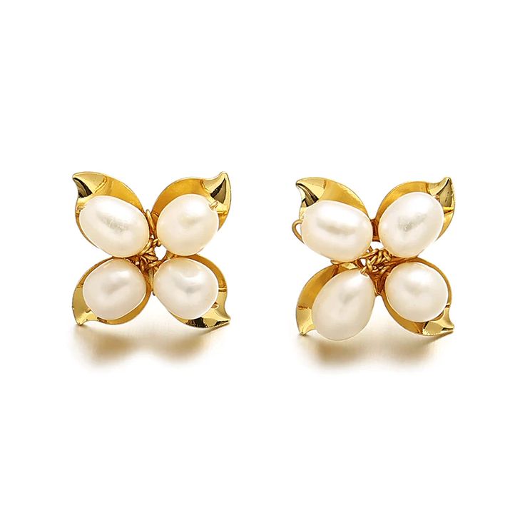 two pairs of earrings with pearls and gold leaves on the front, one is white