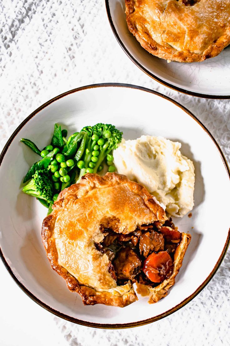 two plates with pies, mashed potatoes and green beans on them next to each other