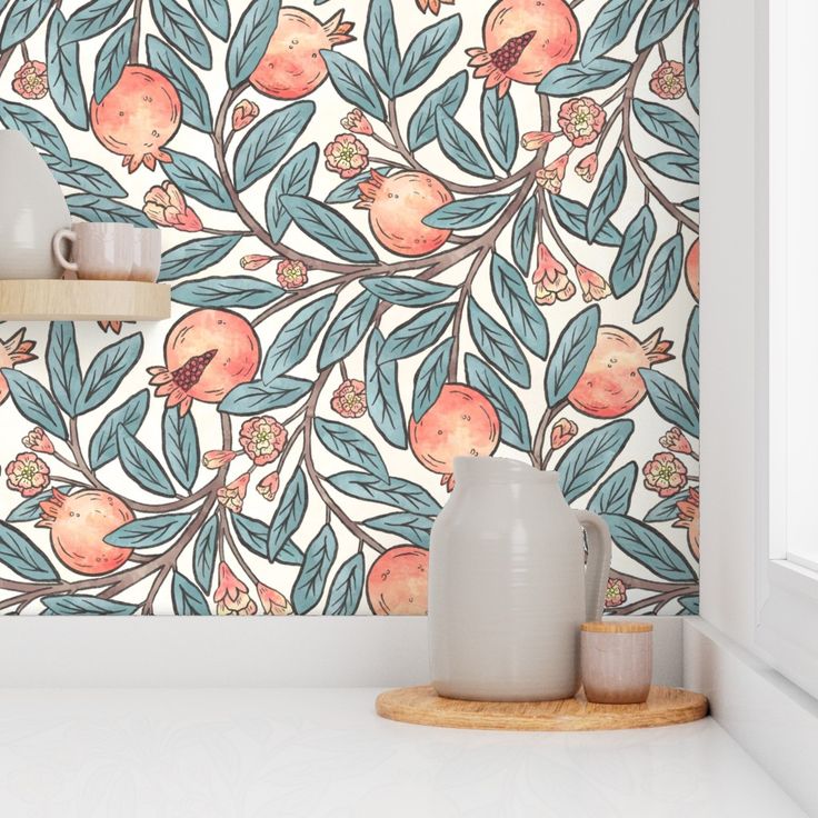 the wallpaper is decorated with oranges and leaves