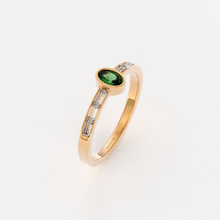 The Bezel Set Vintage Emerald Ring is a timeless expression of elegance and classic beauty. Crafted in 14k Solid Gold, this small oval engagement ring showcases a deep green emerald gemstone in a bezel setting. This ring embodies understated charm, making it an ideal choice for women who appreciate the simplicity and allure of emerald gemstones. Ring Features * 14k Solid Gold (also in 10k,18k ) * Band Options; Yellow Gold, White Gold Rose Gold * Top Width: 6.08x4.23 mm * Band Width: 1.51 mm * Th Elegant Oval Diamond Ring With Baguette Diamonds, Oval Yellow Gold Ring With Baguette Diamonds, Timeless Oval Diamond Ring With Baguette Accents, Timeless Oval Diamond Ring With Baguette Diamonds, Timeless Oval Ring With Baguette Diamonds, Timeless Oval Rings With Baguette Diamonds, Oval Rings With Baguette Diamonds In 14k Gold, Classic Oval Diamond Ring With Baguette Diamonds, Oval 14k Gold Rings With Baguette Diamonds