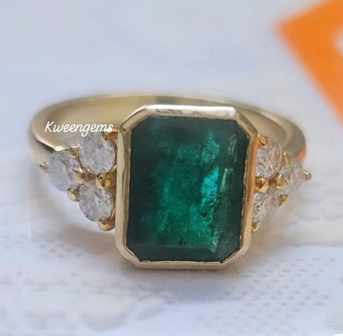 ❤ Kween Gems is an Exclusive Trendy Jewelry Collection for any occasion of Wedding, Engagement, Valentines Day, Anniversary, etc.  FIRST PREFERENCE  ✔ Material : Solid 14K Yellow Gold ✔ Main Stone : Natural Emerald ✔ Secondary Stone : Moissanite Diamonds ( GRA certified )  SECONDARY PREFERENCE  ✔ Material : 925 Sterling Silver ✔ Main Stone : Simulated Emerald ✔ Secondary Stone : Simulated Diamonds ✔ W - white, Y - yellow, R - rose pink ( Rhodium color ) ------------------------------------------ Pear-shaped Emerald Ring With Vvs Clarity For Wedding, Wedding Jewelry Green Stamped 14k, Wedding 14k Stamped Green Jewelry, Green 14k Gold Jewelry For Wedding, Wedding Green Jewelry Stamped 14k, Emerald Jewelry With Prong Setting For Marriage, Emerald Jewelry With Prong Setting For Wedding, Emerald Cut Emerald Ring With 17 Jewels For Wedding, Wedding Cluster Ring Emerald Cut Stamped 14k