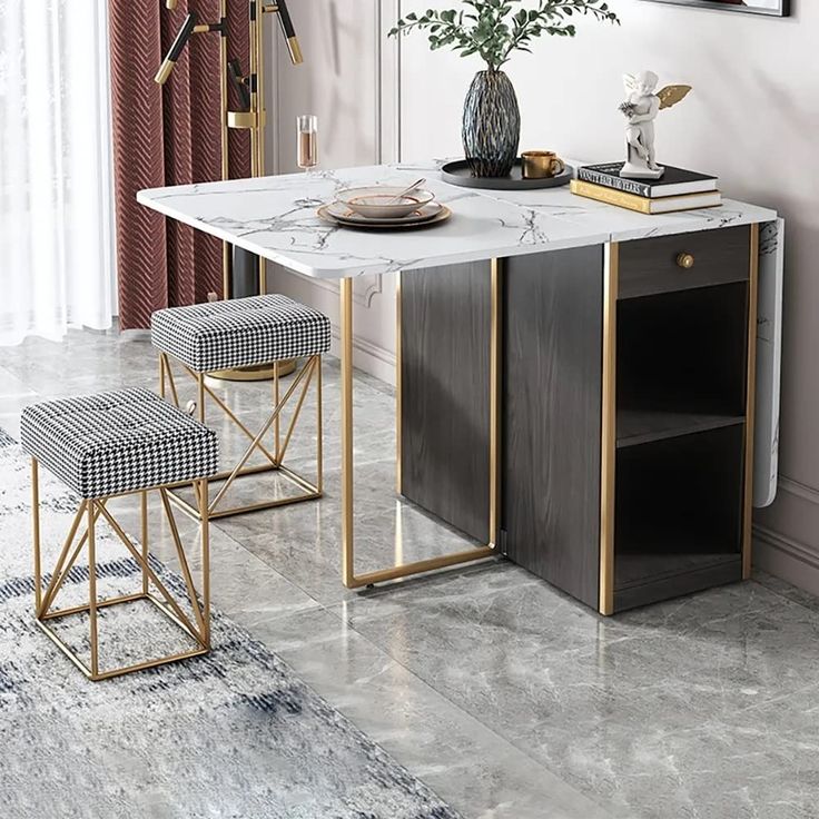 a dining room table with two stools and a vase on the end shelf next to it