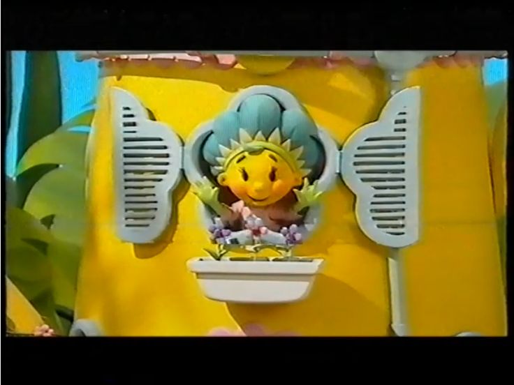 an image of a cartoon character in the sunflower costume on tv screen with flowers growing out of it