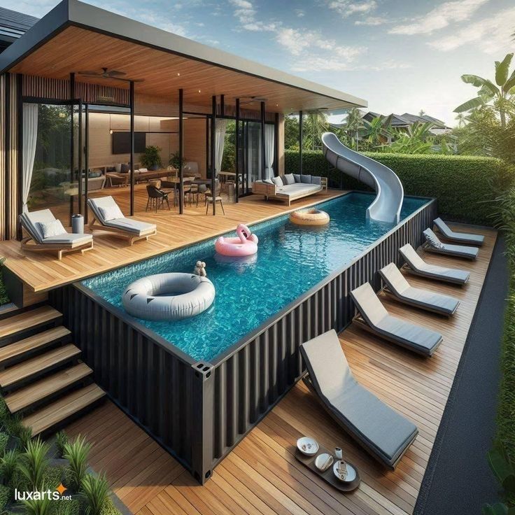 a house with a swimming pool and lounge chairs