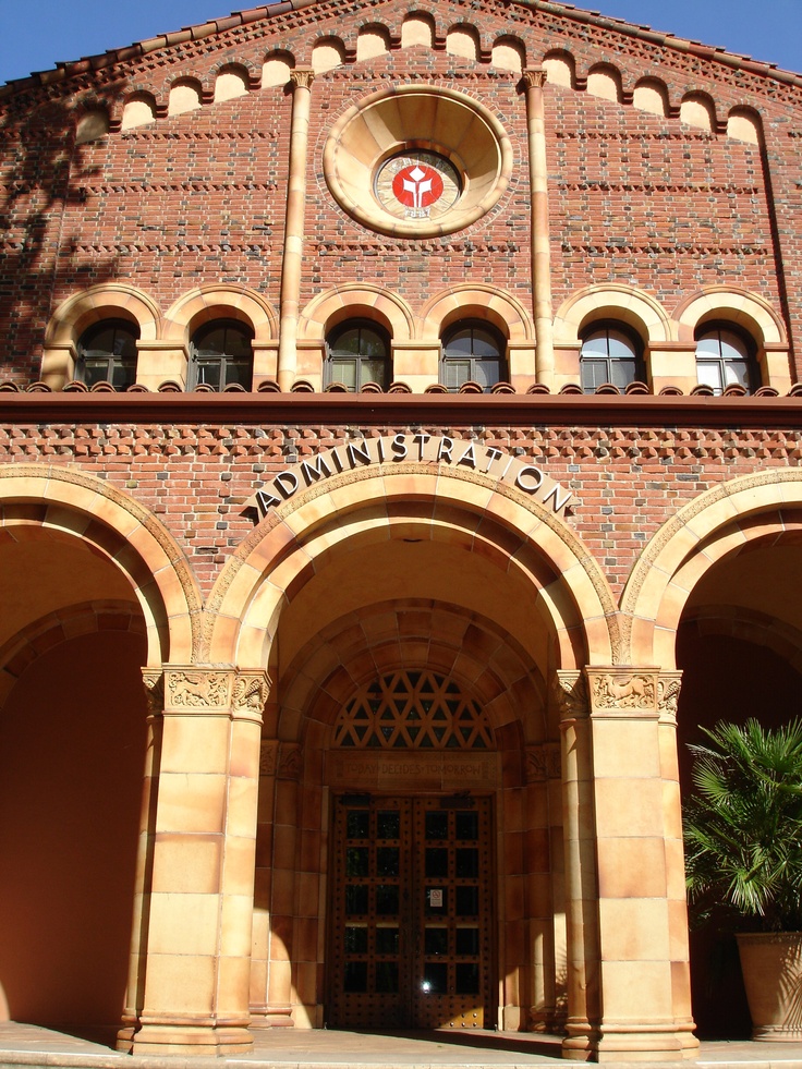 the front entrance to an old brick building