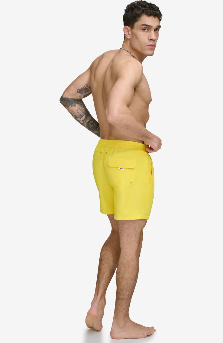 Soak up the sun in these recycled-fiber swim trunks built with UPF 40+ sun protection. 5" inseam (size Medium) Elastic/drawstring waist Front slant pockets; back patch pocket Lined 100% REPREVE polyester REPREVE recycled polyester is made from 100% post-consumer recycled plastic bottles Machine wash, tumble dry Imported Beachwear Swimwear With Built-in Shorts For Outdoor, Yellow Summer Swim Trunks With Built-in Shorts, Nylon Swimwear With Pockets For Summer, Nylon Beachwear Swimwear With Pockets, Summer Vacation Outdoor Shorts, Relaxed Fit Nylon Swim Trunks For Poolside, Sporty Swimwear With Pockets For Beach Season, Summer Style Swim Trunks With Upf 50+, Nylon Swim Trunks For Vacation