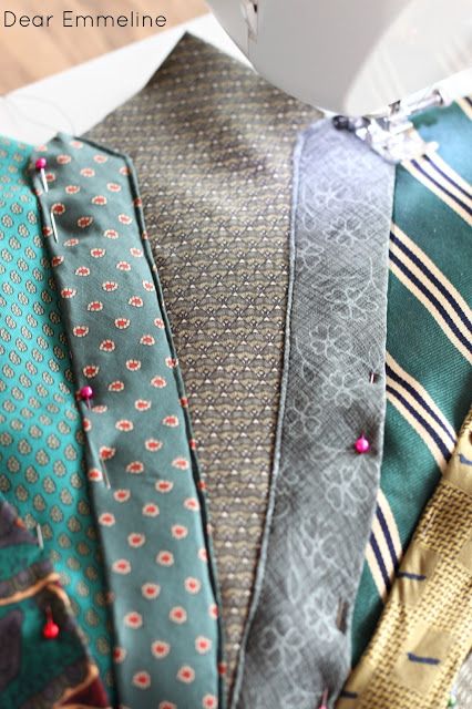 several different colored ties sitting next to each other