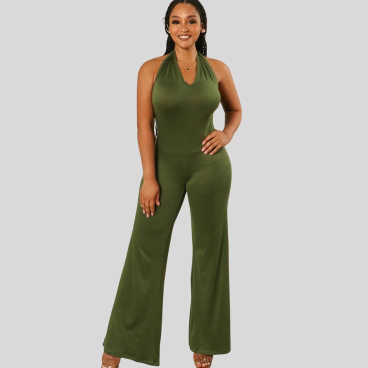 Introducing Elina, the ultimate combination of style and comfort. This Halter Neck Loose leg Jumpsuit is perfect for those who want to make a statement while staying effortlessly chic. Elevate your wardrobe with Elina today! Versatile Fitted V-neck Jumpsuits And Rompers, Versatile Fitted V-neck Jumpsuit, Green Stretch Halter Neck Jumpsuit, Green Stretch Halter Neck Jumpsuits And Rompers, Green Halter Neck Jumpsuit With Stretch, Chic Halter Neck Jumpsuit In Solid Color, Chic Stretch One-piece Jumpsuits And Rompers, Chic Stretch Jumpsuits And Rompers, Solid Color One-piece Jumpsuit For Night Out