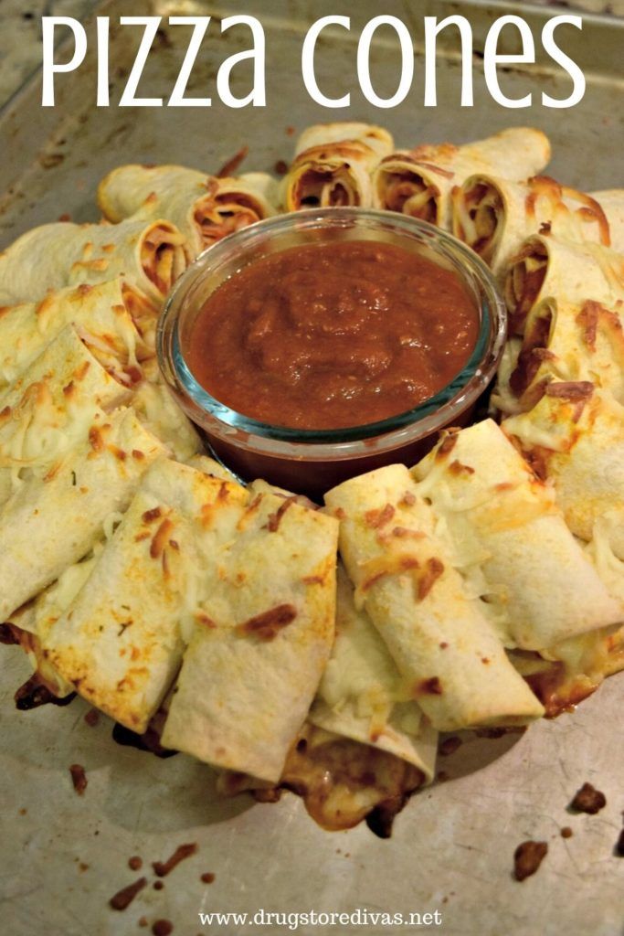 pizza cones with sauce in a glass bowl