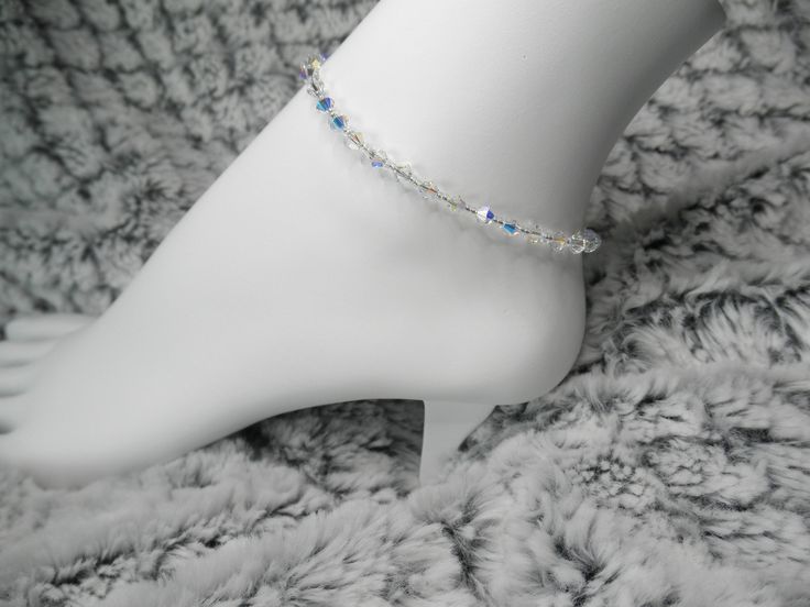 "Length: 8.5\" - 10.5\" Please specify length and components color desired (silver or gold) at drop down menu Sparkly Swarovski Crystal AB Anklet/Ankle Bracelet Simple. Chic. Elegant. Affordable. Appropriate for any woman who wants to dress up her ankle with a bit of bling! So much prettier to see in person! NOTE: I have many more crystal colors to choose from, so please send me a convo and together we can work on the perfect color(s) for you! Composition: Premium Swarovski Crystallized Elements Adjustable Crystal Anklets For Wedding, Adjustable Crystal Anklets In Elegant Style, Elegant Crystal Anklets With Adjustable Fit, Wedding Silver Crystal Anklets, Adjustable Gold Crystal Anklets, Adjustable Crystal Anklets As Gift, Sister Bride, Wedding Anklets, Beach Wedding Gifts