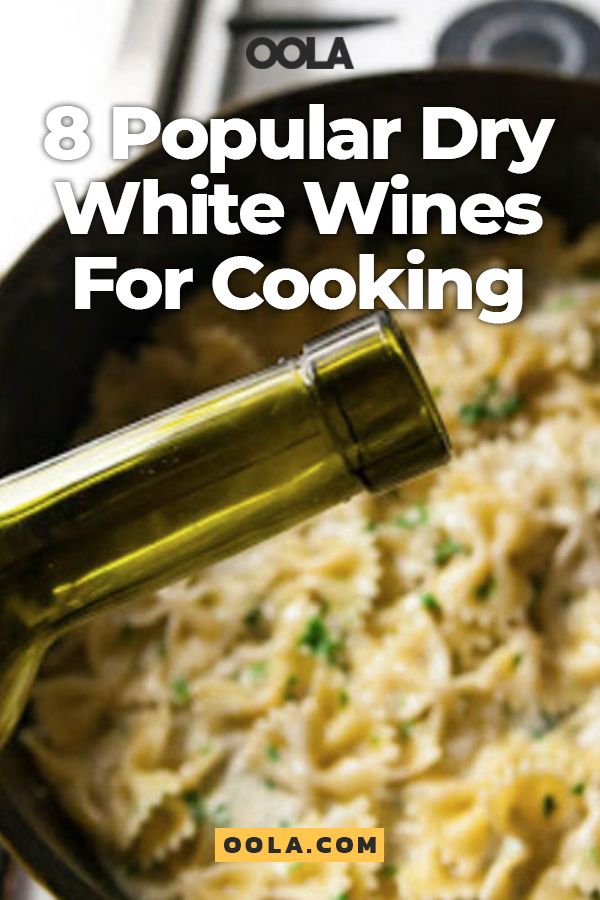 a pot filled with pasta and wine being poured into the pot to make white wine for cooking