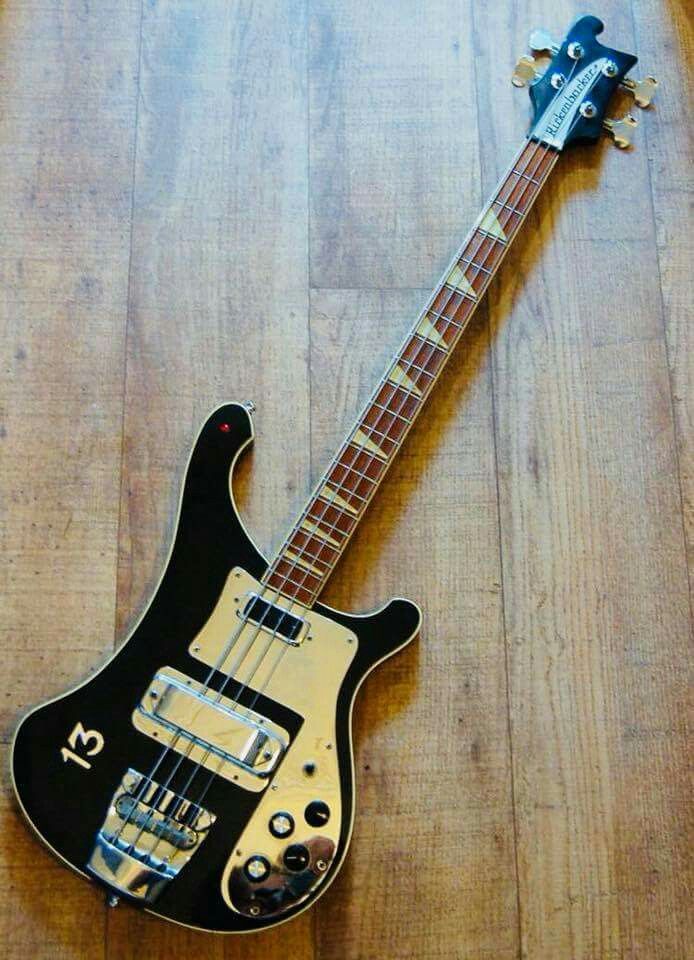 an electric guitar laying on top of a wooden floor