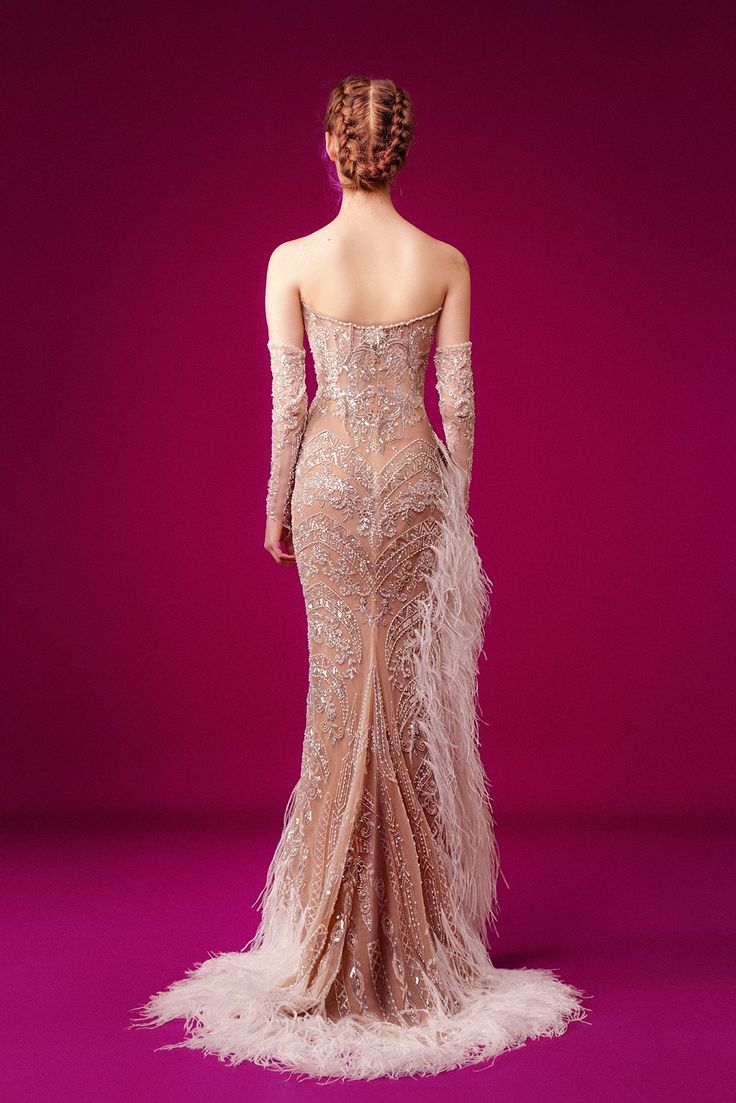 Description Pink Column, Long dress Fitted, Long Sleeves Open neckline Crystal beading, Embroidered lace, Tulle, Feather Dry Clean Evening Dress Made in Lebanon GA 6627 Feather Embellished Dress, Fitted Feathered Gown For Gala, Luxury Feathered Evening Dress For Wedding, Long Sleeve Dresses With Feather Trim For Gala, Fitted Ostrich Feather Dress For Gala, Luxury Feather Trim Evening Dress For Wedding, Luxury Feathered Evening Dress For Gala, Luxury Feathered Dresses For Gala, Fitted Lace Dress With Feather Trim