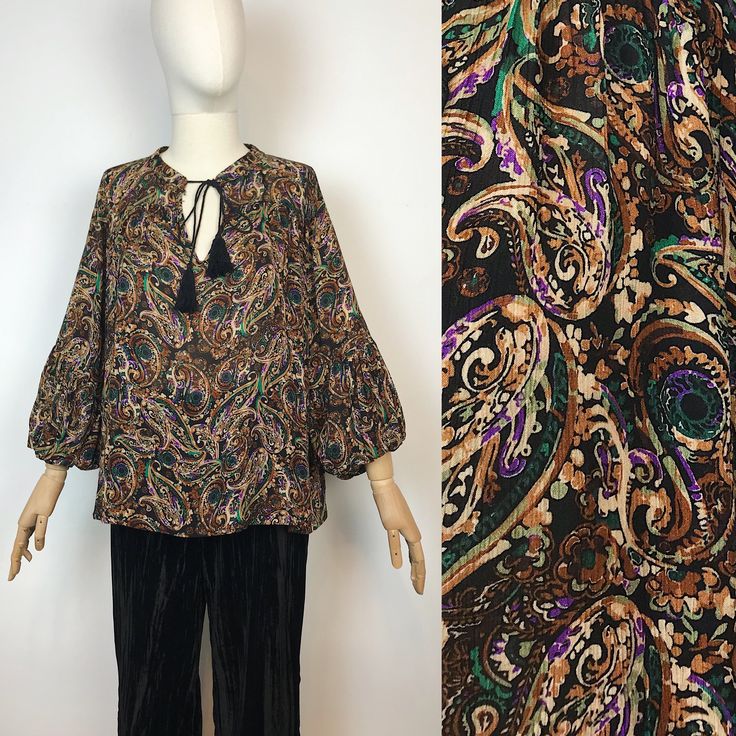 "Bohemian paisley printed blouse  Made in Italy  Brand: Aroma Approx. size: M Material: 100% viscose  In great condition! Measurements: Shoulders: 38 cm - 14,9\" Width armpit to armpit: 70 cm - 27,5\" Sleeve length: 47 cm - 18,5\" Front length: 60 cm - 23,6\" Back length: 68 cm - 26,7\" Any questions - please ask! :)" Patterned Long Sleeve Boho Print Blouse, Long Sleeve Patterned Blouse With Paisley Print, Bohemian Printed Viscose Blouse, Multicolor Long Sleeve Blouse With Paisley Print, Fall Paisley Print Flowy Blouse, Patterned Boho Print Long Sleeve Peasant Top, Patterned Long Sleeve Peasant Top With Boho Print, Patterned Printed Peasant Top For Fall, Long Sleeve Patterned Peasant Top With Boho Print