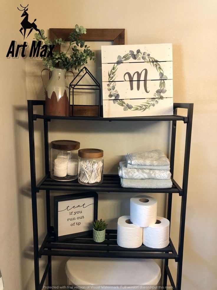 a bathroom shelf with toilet paper and other items on it