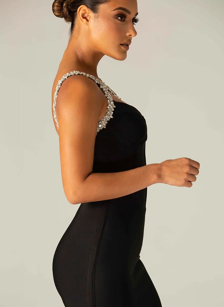 As an expert in the fashion industry, trust the Alina Midi Dress for a sleek and flattering look. Made with a blend of nylon, rayon, and spandex, this dress boasts a plunging neckline and bandage fabric to enhance your figure. Perfect for any occasion. Glamorous Evening Dress With Built-in Bra, Chic Evening Bodycon Dress With Built-in Bra, Fitted V-neck Bandage Dress For Evening, Elegant Bodycon Dress With Built-in Bra, Elegant Mini Dress With Built-in Bra For Evening, Elegant Mini Dress With Built-in Bra, Sleeveless Bandage Dress For Gala, Elegant V-neck Bandage Mini Dress, Fitted V-neck Mini Dress For Gala