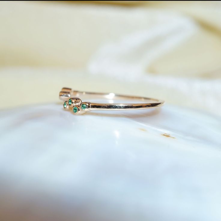 "Materials Gold, Rose gold, White gold Gemstone: Emerald 14k Gold Open Cuff Emerald Ring / Stackable Ring / Dainty Ring / Natural Emerald Ring / Emerald Stacking Ring / Open Ring / Solid Gold Ring Item Details ✔ Made to Order ✔ Gold Kt: 14K (also available in 18K) ✔ Available Gold Color: Rose Gold, Yellow Gold, White Gold ✔ Total ctw: 0.04Ctw ✔ Width of Band: 1 MM ✔ Ready to Ship in 7-10 Business Days * Also available in other gemstone colors please inquire If you have any additional questions a Fine Jewelry Open Band Birthstone Promise Ring, Fine Jewelry Birthstone Promise Ring With Open Band, Gold Cluster Ring With Birthstone For Promise, Gold Cluster Ring For May Birthstone, Promise Ring With Birthstone And Open Band, Gold Crystal Promise Ring For May Birthstone, Fine Jewelry Rose Gold Ring For May Birthstone, May Birthstone Stackable Open Rings In Fine Jewelry, Gold Open Band Birthstone Promise Ring