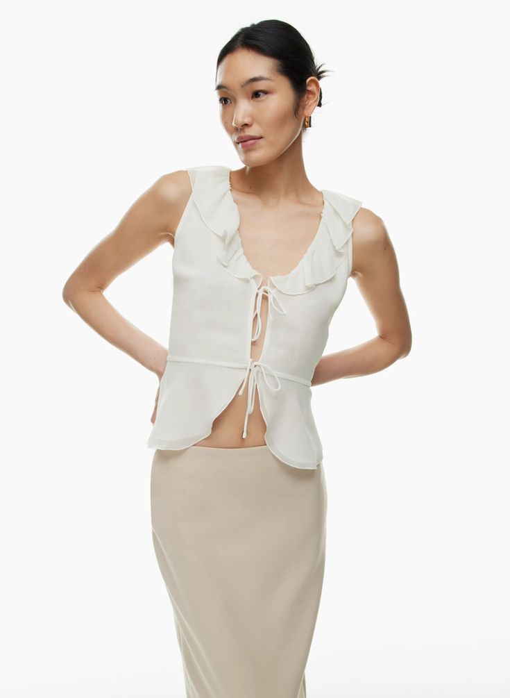 FLITTER BLOUSE | Aritzia Chic V-neck Blouse With Ruffle Hem, Chic Summer Blouse With Ruffle Hem, V-neck Party Top With Ruffle Hem, Chic Spring Tie Neck Tops, Chiffon V-neck Blouse For Day Out, Feminine Chiffon Tops For Brunch, Spring Sleeveless Chiffon Blouse, Flirty V-neck Summer Blouse, Elegant Sleeveless Chiffon Blouse