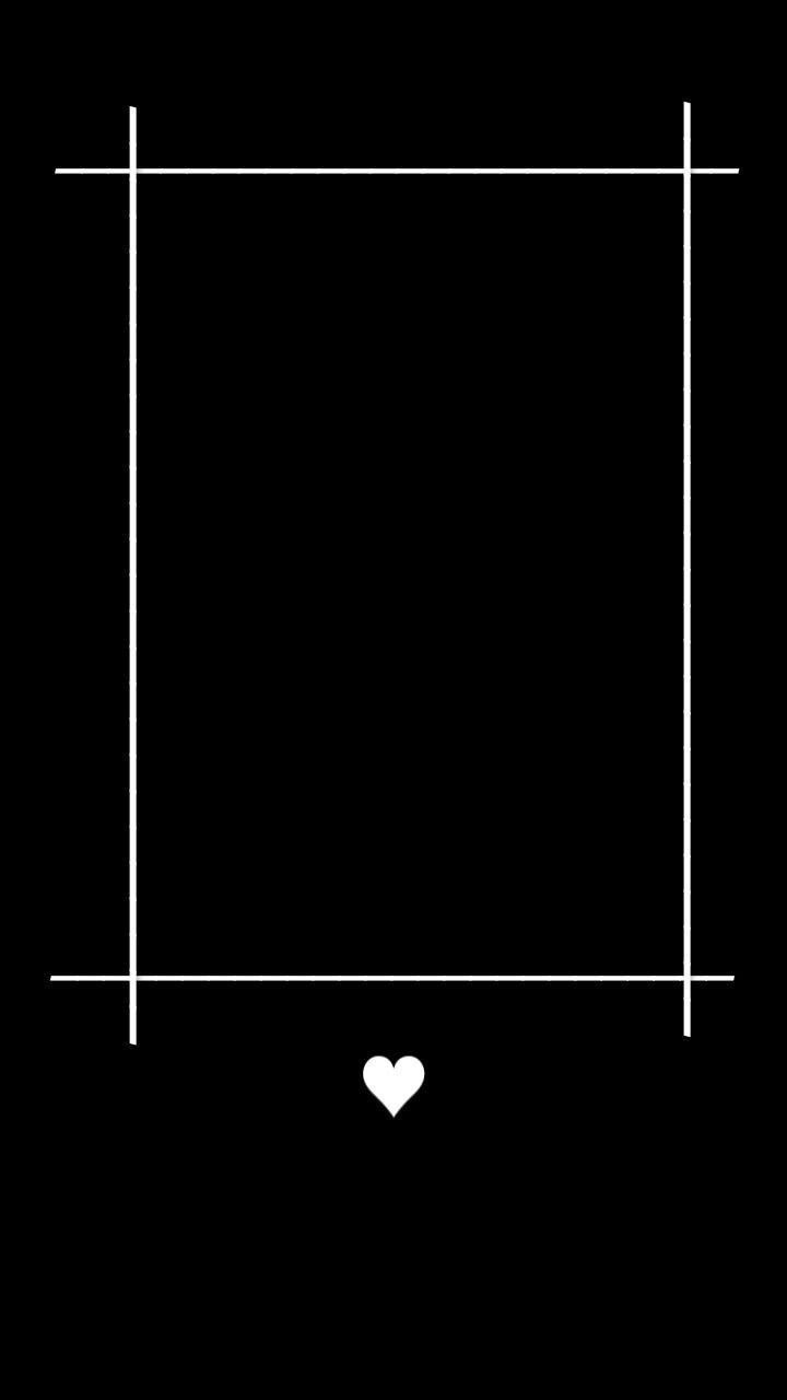 a black and white photo frame with a heart in the middle on a black background