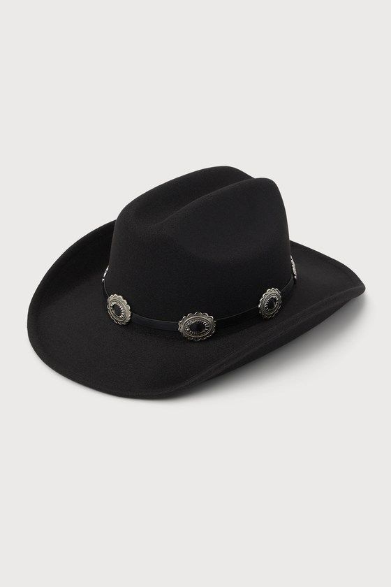 Show up to any festival this season like a total cowgirl cutie with the Lulus Wild West Wonder Black Conch Cowboy Hat! This rodeo-ready hat has a sturdy felt construction that shapes a dramatic flipped-up brim and a classic pinched top. A matching, smooth faux leather band features silver metal conch embellishments that complete the Western-style look! 3. 25" soft brim. 25" interior circumference with internal drawstring. Crown measures 4. 25" tall. 90% Polyester, 10% Alloy. Imported. Lulus | Wild West Wonder Black Conch Cowboy Hat. Black Western Top Hat For Rodeo, Western Black Felt Hat For Ranch, Black Western Top Hat For Ranch, Black Western Style Top Hat For Ranch, Western Black Hat Band For Western-themed Events, Western Black Hat Bands For Country Events, Western Black Brimmed Felt Hat, Western Style Black Top Hat For Western-themed Events, Black Western Felt Hat With Curved Brim